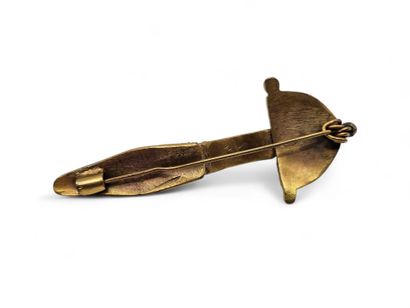 Replica of a barbarian arched fibula in gilt...