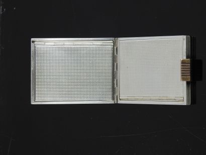 BOUCHERON Paris. Rectangular silver poudrier...