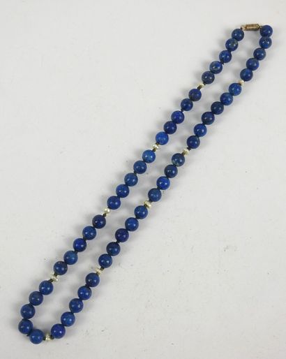 NECKLACE of lapis lazuli beads alternated...