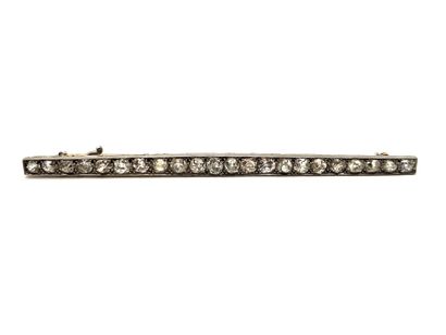 18K (750°/°°) white and yellow gold barrette...