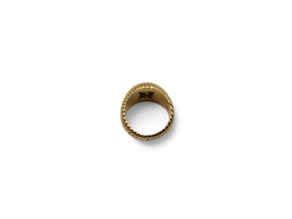 Yellow gold 750 thousandths chased ring centered...