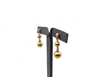 Pair of 750 thousandths yellow gold earrings...