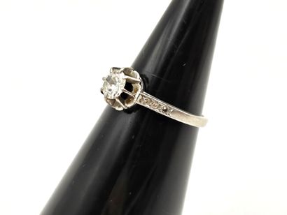 Solitaire platinum ring centered on a round...