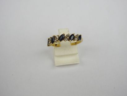 Half wedding band in 750 thousandths gold...