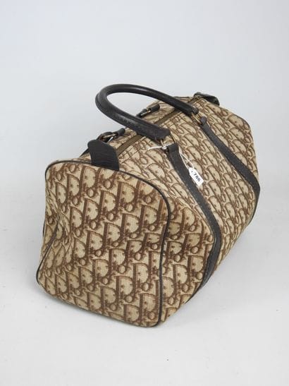 CHRISTIAN DIOR - Paris. Sac de voyage en...