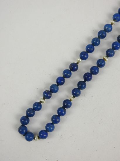 NECKLACE of lapis lazuli beads alternated...