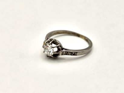 Solitaire platinum ring centered on a round...