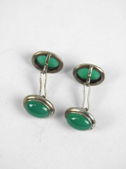 Pair of silver and green stone cabochon HANDLEBUTTONS....
