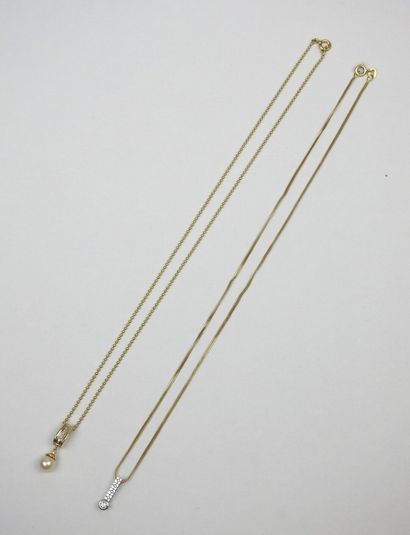 TWO CHAINS in 750/1000th yellow gold with...