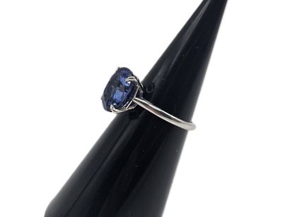 750 thousandths white gold ring centered...