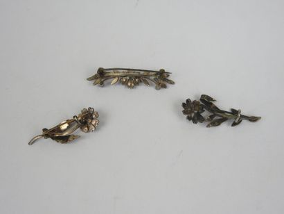 Set of three flower brooches set with pearls...