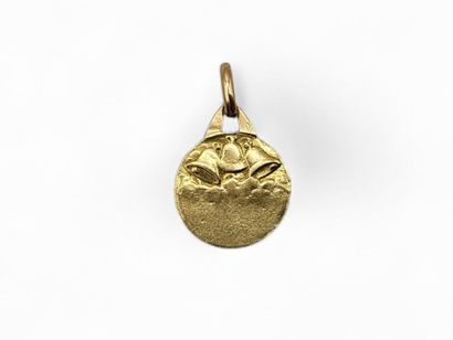 Circular religious medal in 750-thousandth...