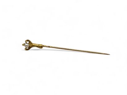 Tie-pin in 750 thousandths yellow gold, the...