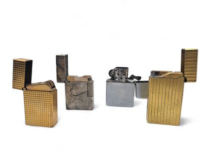 Set of 4 gilt and silver-plated metal lighters...
