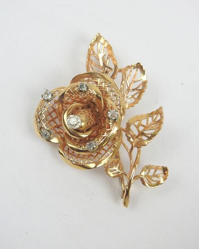 Flower brooch in 750/1000 yellow gold set...