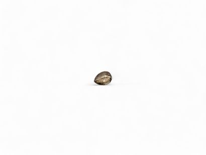 1.01 carat pear-cut Fancy diamond on paper.

With...