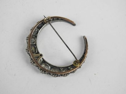 TWO crescent moon brooches, covered with...