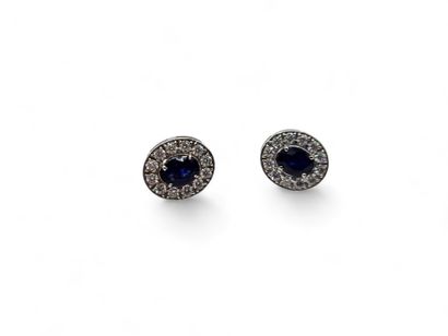 Pair of 750 thousandths white gold oval stud...