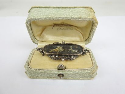 Antique brooch with grisaille painting on...