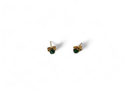 Pair of 750 thousandths yellow gold stud...