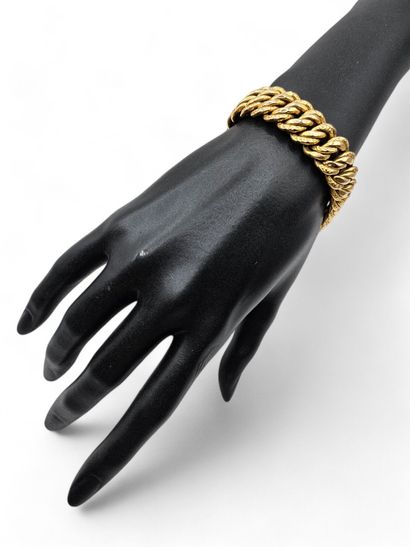 Double American link bracelet in yellow gold...