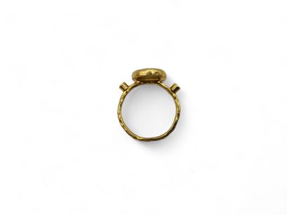 Hammered gold-plated silver ring centered...