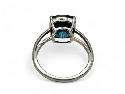 750 thousandths white gold ring centered...