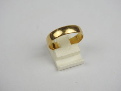 Wedding band in 750 thousandths gold, engraved...