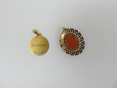 Two pendants in yellow gold 750 thousandths,...