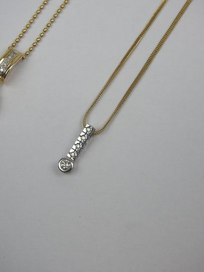 TWO CHAINS in 750/1000th yellow gold with...