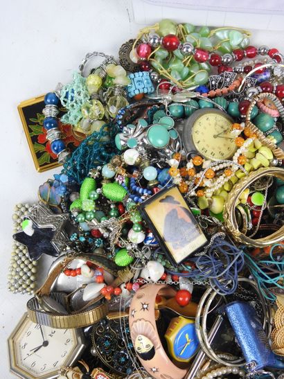 Large lot of costume jewelry, watches including...