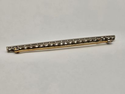 18K (750°/°°) white and yellow gold barrette...