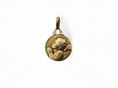 Circular religious medal in 750-thousandth...