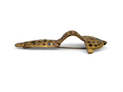 Replica of a barbarian arched fibula in gilt...