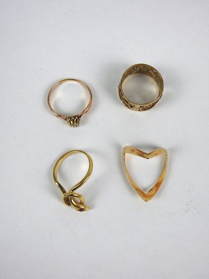 FOUR RINGS in 750/1000th yellow gold, one...