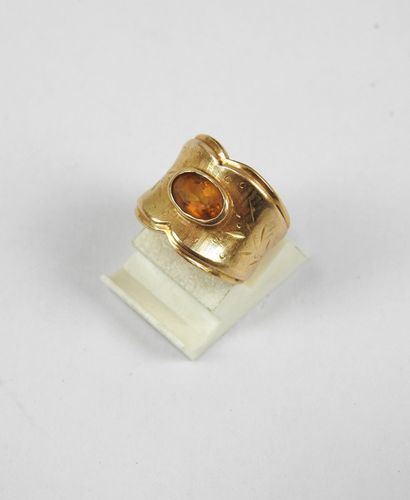 750/1000th yellow gold and citrine band ring....
