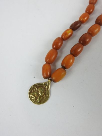 MEDALTTE in yellow gold 750/1000e engraved...