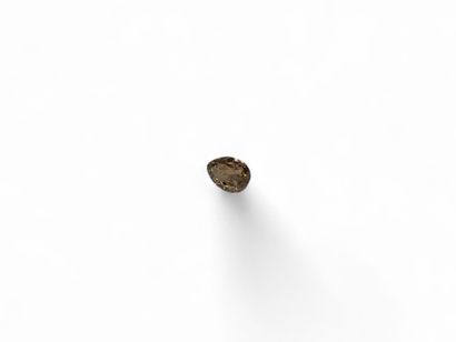 1.01 carat pear-cut Fancy diamond on paper.

With...
