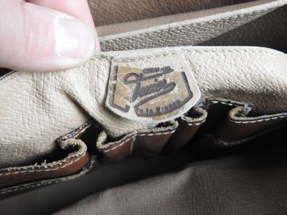 Four HANDBAGS, three in leather and one in...