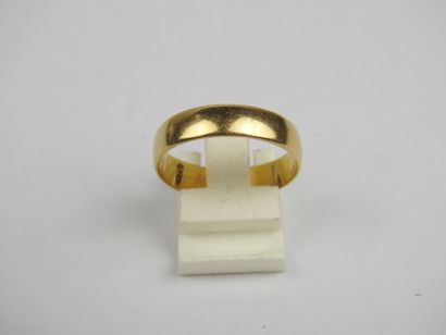 Wedding band in 750 thousandths gold, engraved...
