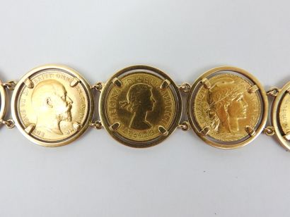 GOLD BRACELET adorned with 7 coins from various...