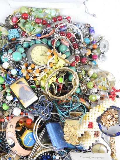 Large lot of costume jewelry, watches including...