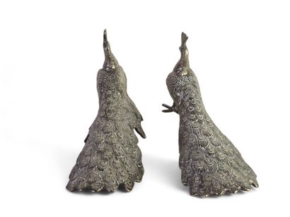 Pair of peacocks in silver-plated bronze....