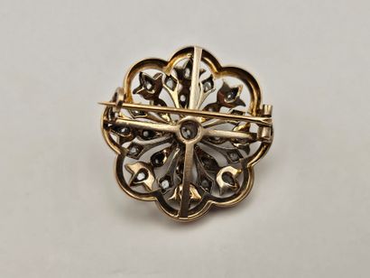 18K (750°/°°) yellow gold and silver openwork...