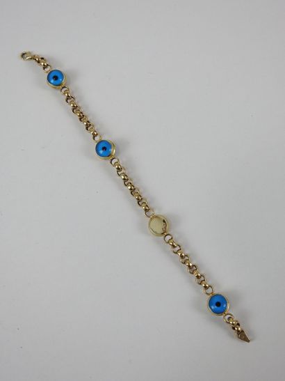 BRACELET in 14K yellow gold with glass cabochon...