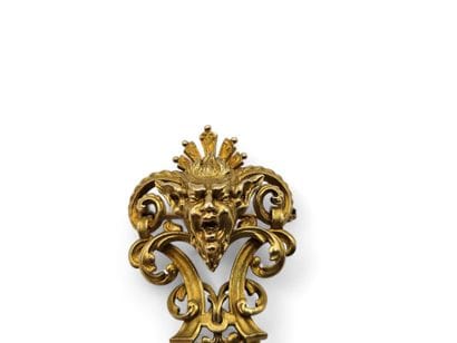 A solid 750-thousandths yellow gold brooch...