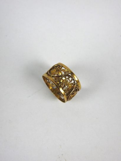 FOUR RINGS in 750/1000th yellow gold, one...