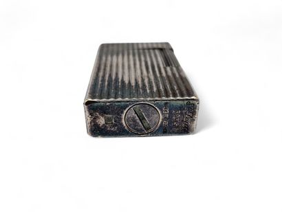 ST DUPONT.
Rectangular lighter in striated...