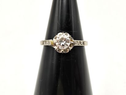 Solitaire platinum ring centered on a round...