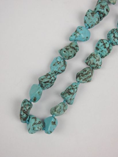 NECKLACE in polished rough turquoise. Silver-plated...